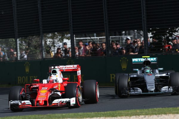 Formula One World Championship 2016, Round 1, Australian Grand Prix, Melbourne, Australia, Sunday 20 March 2016 - Sebastian Vettel (GER), Scuderia Ferrari and Nico Rosberg (GER), Mercedes AMG F1 Team