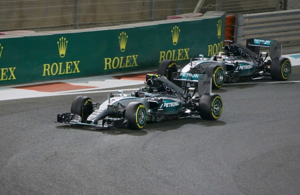 Nico Rosberg (GER) Mercedes AMG F1 W06 and Lewis Hamilton (GBR) Mercedes AMG F1 W06 celebrate at the end of the race at Formula One World Championship, Rd19, Abu Dhabi Grand Prix, Race, Yas Marina Circuit, Abu Dhabi, UAE, Sunday 29 November 2015.